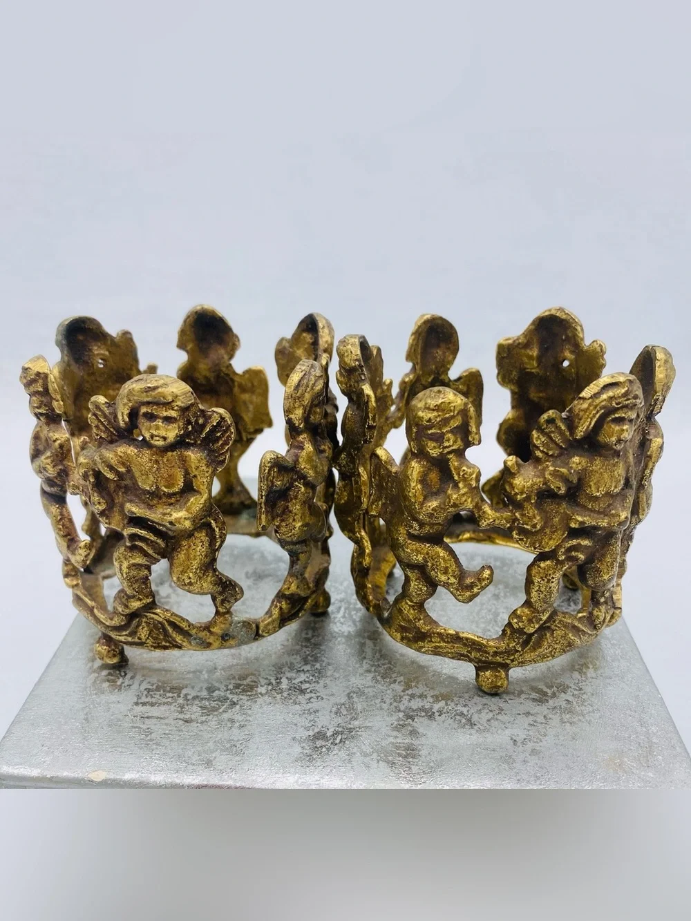 Two Vintage Footed Brass Votive/Tea Light Candle Holders Feature Dancing Cherubs